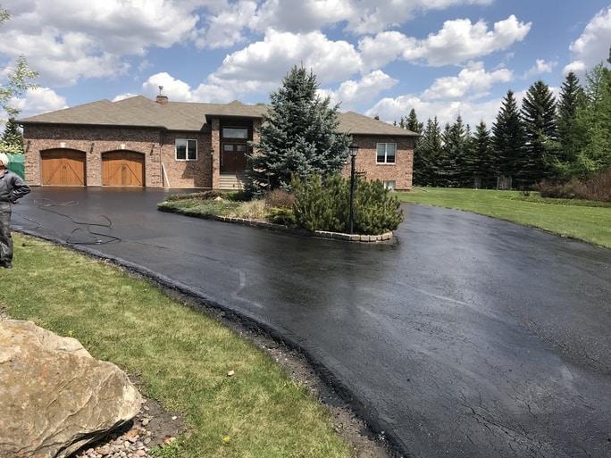 Asphalt Seal Coating done on an acerage